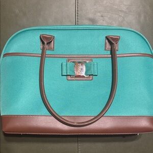 Travelers Polo & Racquet Club laptop carry-on canvas bag in green and brown.